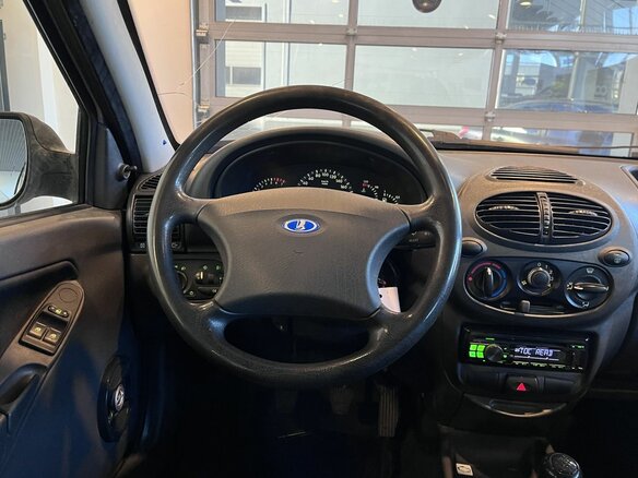 2012 Lada (ВАЗ) Kalina I, серебристый, 280000 рублей - вид 9
