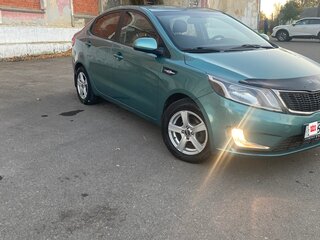 2013 Kia Rio III, зелёный, 610000 рублей, вид 2