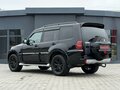 2014 Mitsubishi Pajero IV Рестайлинг 1, чёрный - вид 4