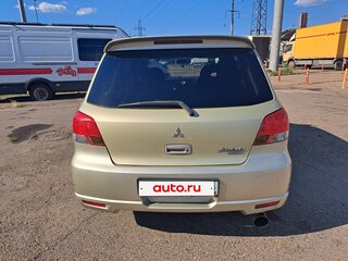 2002 Mitsubishi Airtrek I, золотистый, 739000 рублей, вид 4