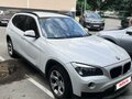 2014 BMW X1 20i I (E84) Рестайлинг, белый, 1800000 рублей - вид 1