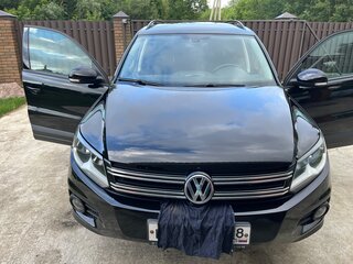 2015 Volkswagen Tiguan I Рестайлинг, чёрный, 1859580 рублей, вид 1