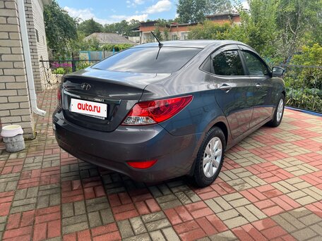 2013 Hyundai Solaris I, чёрный, 680000 рублей, вид 3