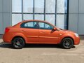 2010 Kia Rio II Рестайлинг, оранжевый - вид 7