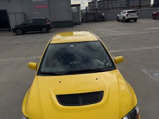 2006 Mitsubishi Lancer Evolution IX, жёлтый, 3000000 рублей, вид 1