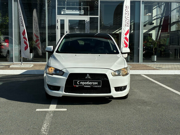 2007 Mitsubishi Lancer X, белый - вид 1
