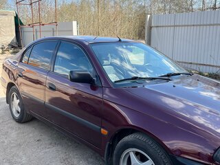 1998 Toyota Avensis I, пурпурный, 450000 рублей, вид 5