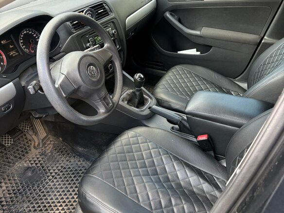 2012 Volkswagen Jetta VI, чёрный - вид 5