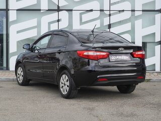 2012 Kia Rio 5-speed III, чёрный, 696000 рублей, вид 3