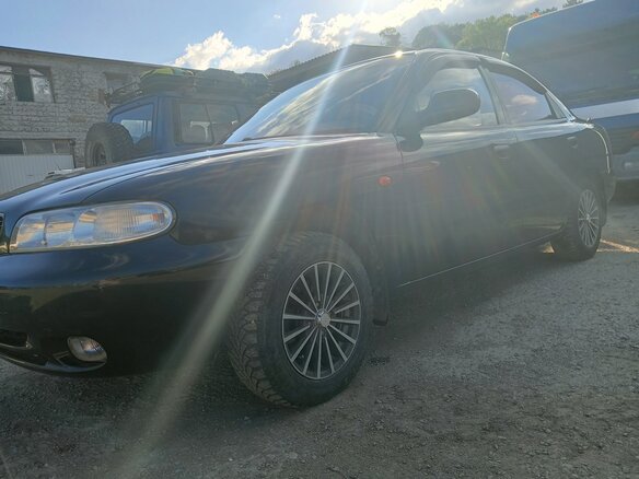 1999 Daewoo Nubira I, чёрный, 300000 рублей - вид 27