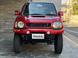 2013 Suzuki Jimny Kei car III Рестайлинг 2, красный, 785000 рублей, вид 2