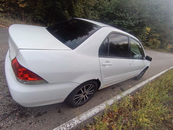 2003 Mitsubishi Lancer Cedia IX, белый, 350000 рублей - вид 15