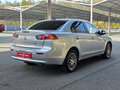 2010 Mitsubishi Lancer X, серебристый, 699900 рублей - вид 6