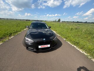 2011 BMW 1 серии 118i II (F20/F21), чёрный, 900000 рублей, вид 3