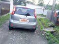 2007 Nissan Note I, серый, 400000 рублей - вид 6