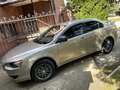 2008 Mitsubishi Lancer X, бежевый, 699999 рублей - вид 2