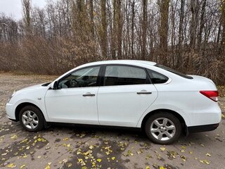 2014 Nissan Almera III (G15), белый, 900000 рублей, вид 2