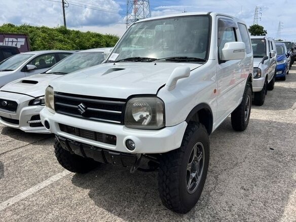 2013 Suzuki Jimny Kei car III Рестайлинг 2, белый - вид 1