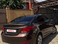 2014 Hyundai Solaris I Рестайлинг, коричневый, 849000 рублей - вид 3