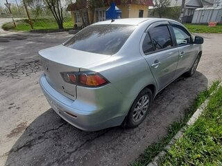 2010 Mitsubishi Lancer X, серебристый, 699999 рублей, вид 2