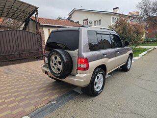 1998 Mitsubishi Pajero iO, коричневый, 649000 рублей, вид 3