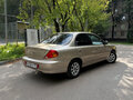 2009 Kia Spectra I Рестайлинг 2, бежевый - вид 2