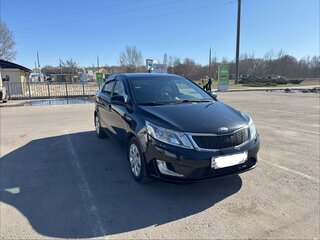 2013 Kia Rio III, чёрный, 755653 рублей, вид 1