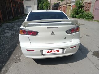 2014 Mitsubishi Lancer X Рестайлинг, белый, 619000 рублей, вид 1