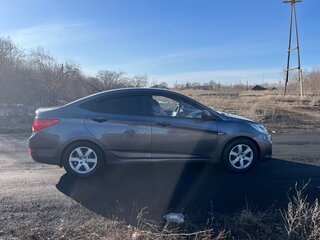 2011 Hyundai Solaris I, чёрный, 850000 рублей, вид 2