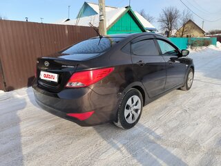2015 Hyundai Solaris I Рестайлинг, коричневый, 870000 рублей, вид 3
