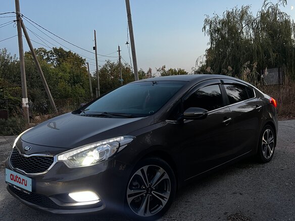 2016 Kia Cerato III Рестайлинг (Classic), коричневый, 1450000 рублей - вид 2