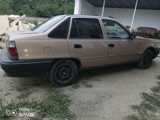 2001 Daewoo Nexia I, бежевый, 280000 рублей, вид 4