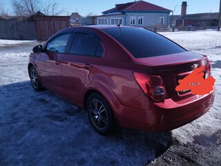 2012 Chevrolet Aveo II, красный, 900000 рублей, вид 5