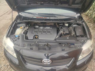2007 Toyota Corolla AMT X (E140, E150), чёрный, 820000 рублей, вид 2