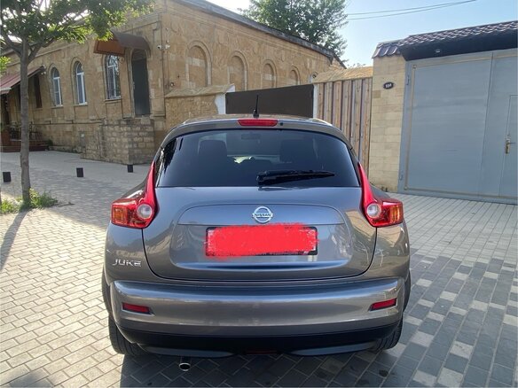 2014 Nissan Juke I, серый, 1350000 рублей - вид 3