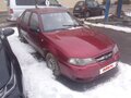 2012 Daewoo Nexia I Рестайлинг, пурпурный - вид 2