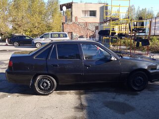 2014 Daewoo Nexia I Рестайлинг, чёрный, 180000 рублей, вид 2