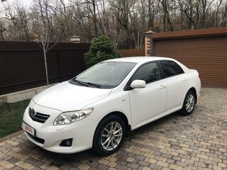 2008 Toyota Corolla AMT X (E140, E150), белый, 850000 рублей, вид 1