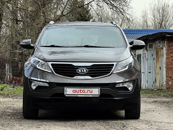 2011 Kia Sportage III, коричневый, 1250000 рублей - вид 1