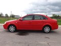 2009 Chevrolet Lacetti I, красный - вид 1