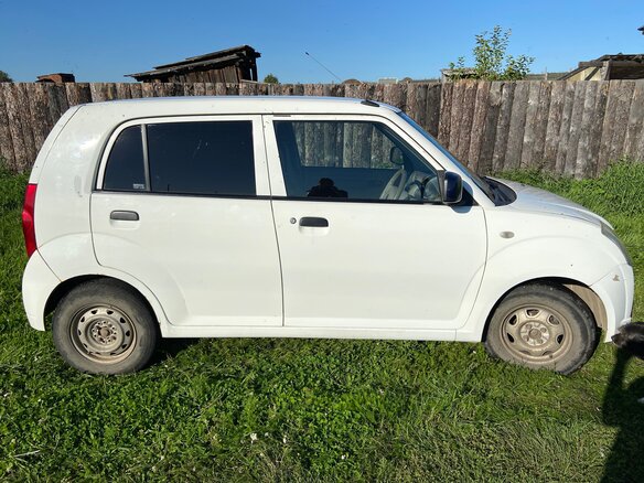 2009 Suzuki Alto VI (HA24), белый - вид 2