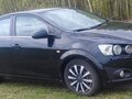 2013 Chevrolet Aveo II, чёрный, 570000 рублей - вид 2