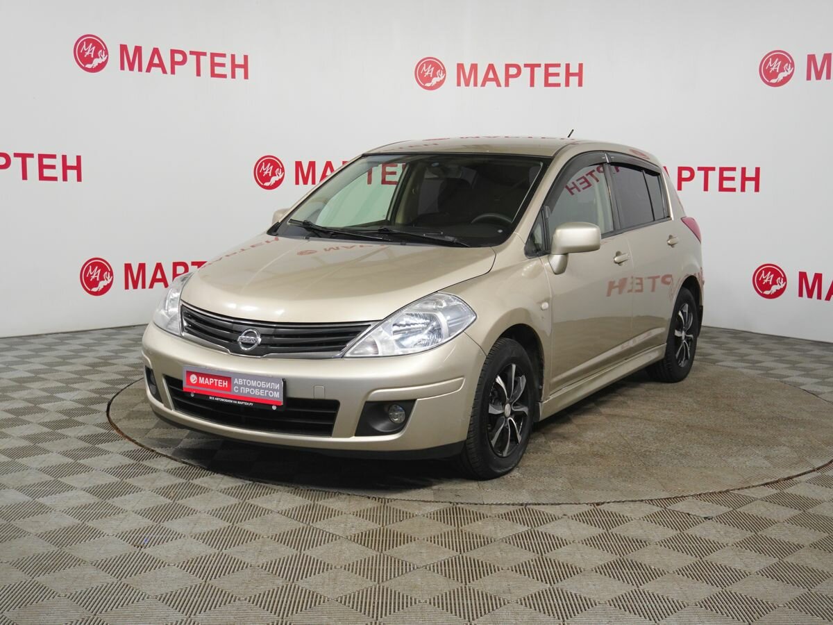 Открыть фотографии: Nissan Tiida I Рестайлинг
