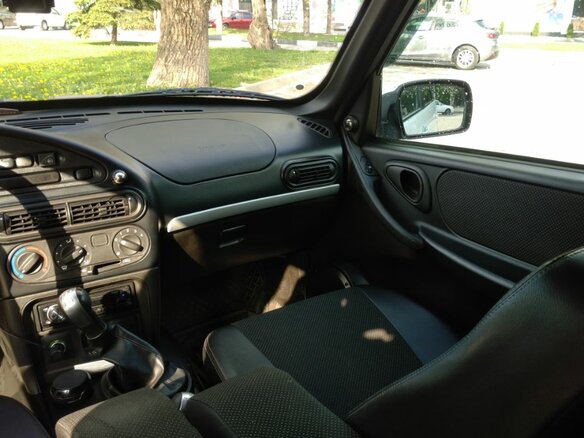 2012 Chevrolet Niva I Рестайлинг, белый - вид 11
