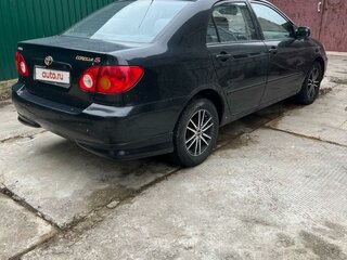 2002 Toyota Corolla IX (E120, E130), чёрный, 700000 рублей, вид 4