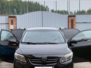 2009 Toyota Corolla X (E140, E150), чёрный, 700000 рублей, вид 2