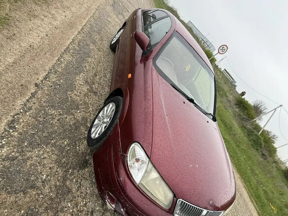 2001 Nissan Sunny N16, красный, 330000 рублей - вид 12