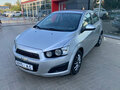 2013 Chevrolet Aveo II, серебристый - вид 3