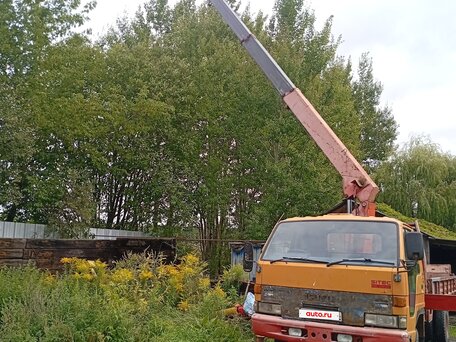 1993 Isuzu Elf (N-series), золотистый, 1750000 рублей, вид 3
