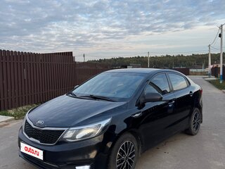 2015 Kia Rio III Рестайлинг, чёрный, 600000 рублей, вид 1